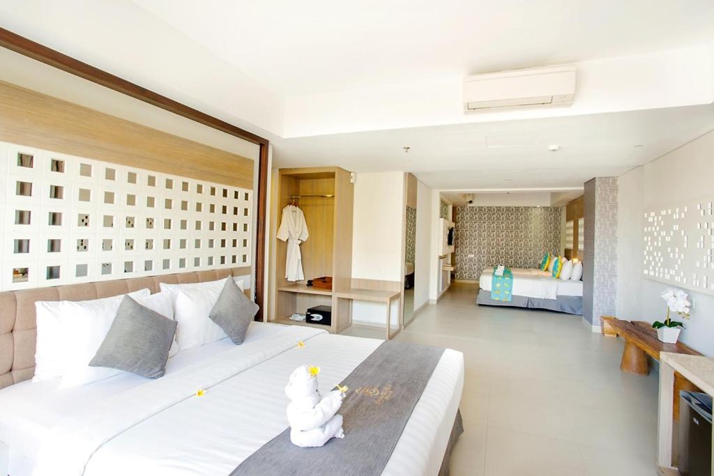 Jimbaran Bay Beach Resort and Spa by Prabhu - Condong Family Suite