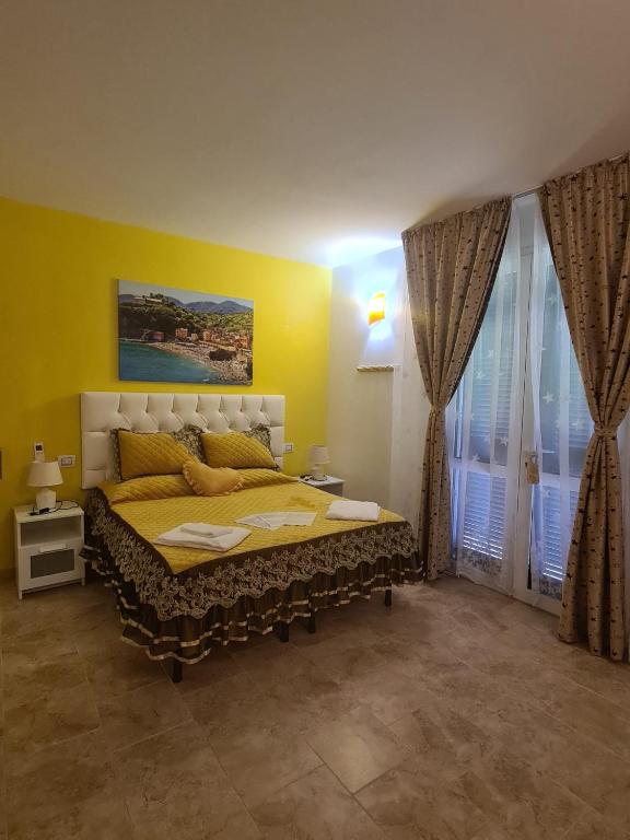Postel nebo postele na pokoji v ubytování Agriturismo La Collina Verde