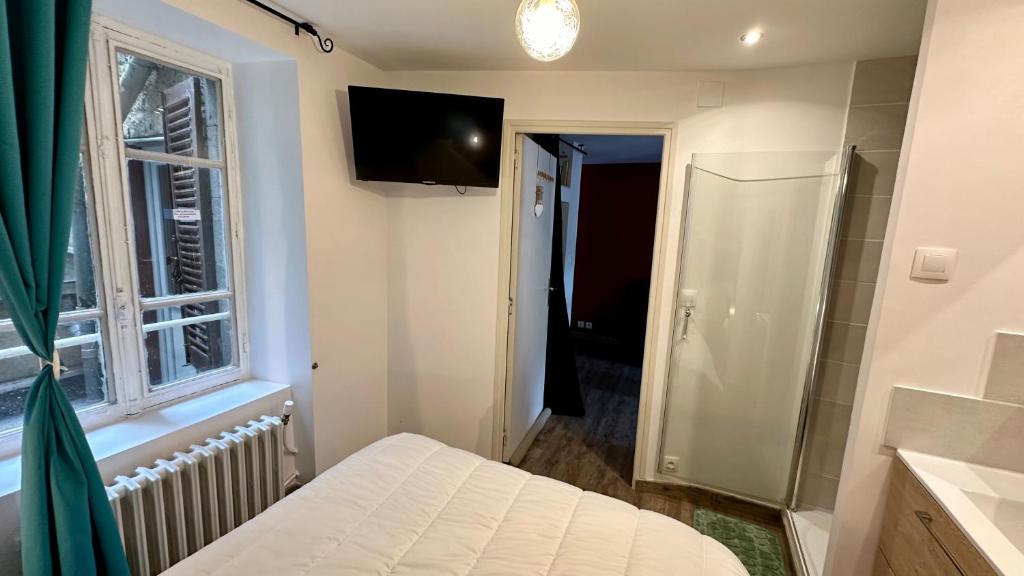 Posteľ alebo postele v izbe v ubytovaní Villa Blanche appartement 2