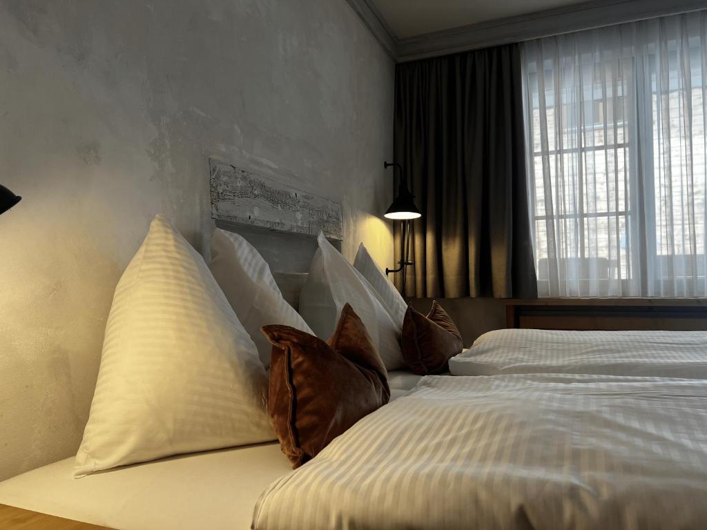 Postel nebo postele na pokoji v ubytování Hotel Berghof