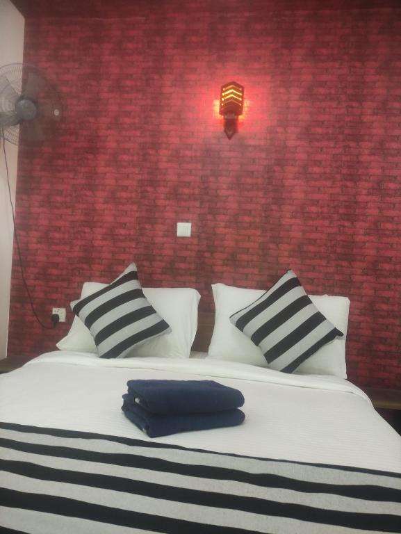 Postel nebo postele na pokoji v ubytování MUM Jungle Inn
