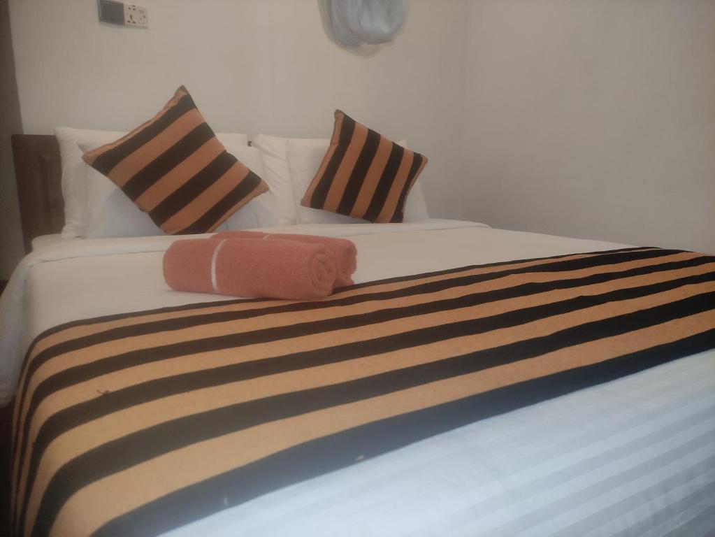Postel nebo postele na pokoji v ubytování MUM Jungle Inn