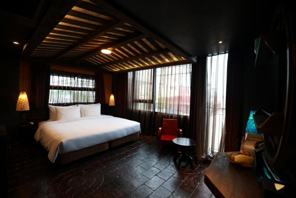 Postel nebo postele na pokoji v ubytování Kecho Legacy Hotel Hanoi & Spa