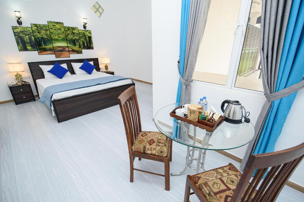 Postel nebo postele na pokoji v ubytování Royal Blu