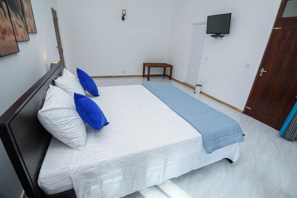 Postel nebo postele na pokoji v ubytování Royal Blu