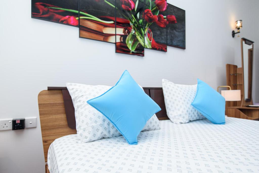 Postel nebo postele na pokoji v ubytování Royal Blu