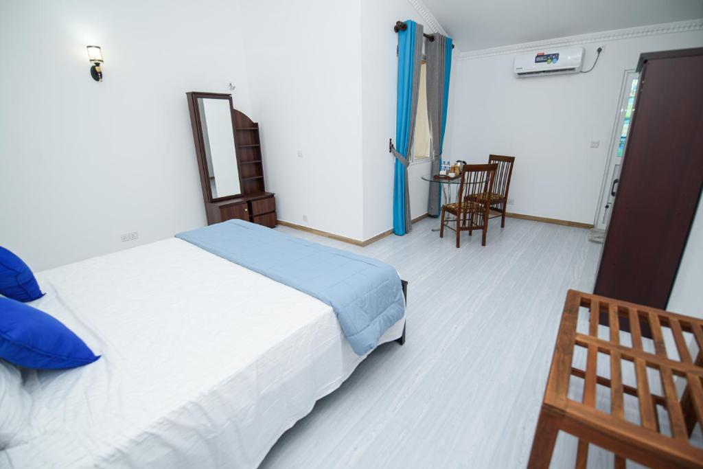 Postel nebo postele na pokoji v ubytování Royal Blu