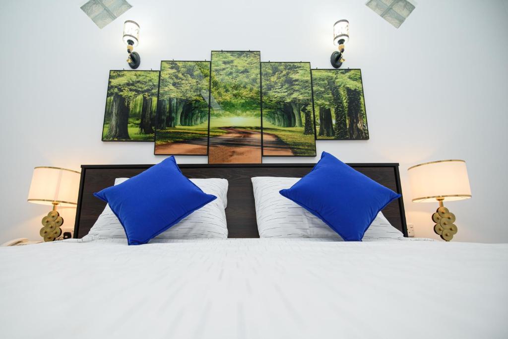 Postel nebo postele na pokoji v ubytování Royal Blu