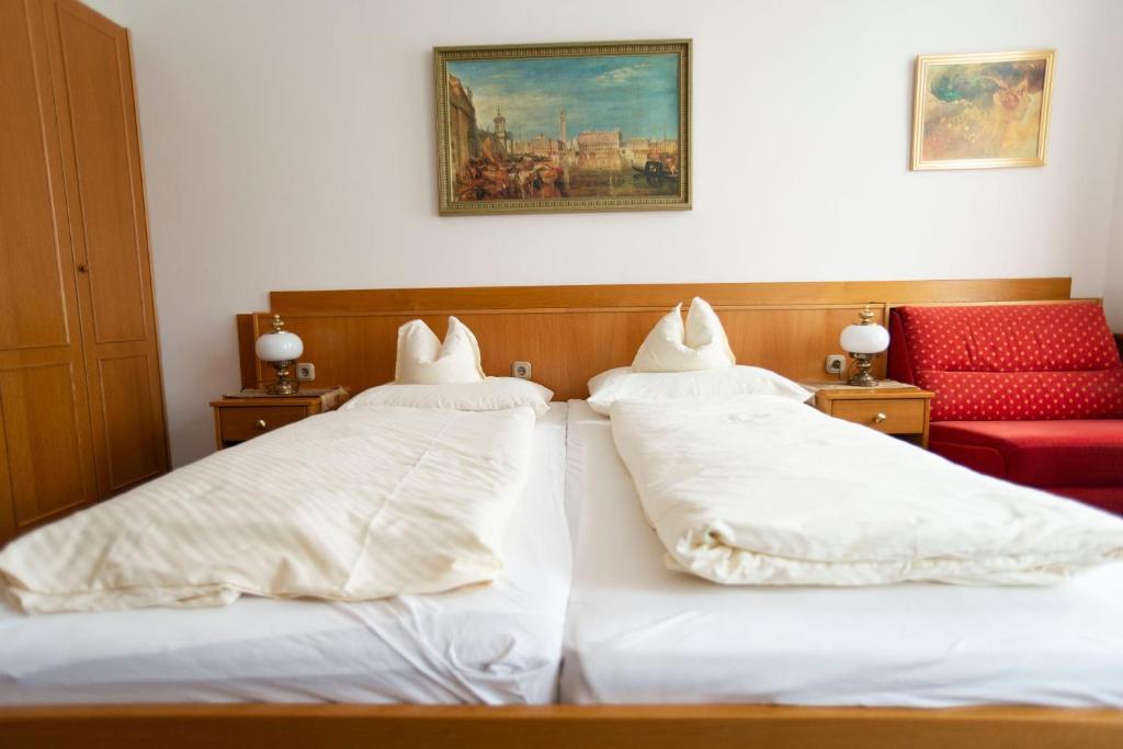 Posteľ alebo postele v izbe v ubytovaní Fleger Appartements