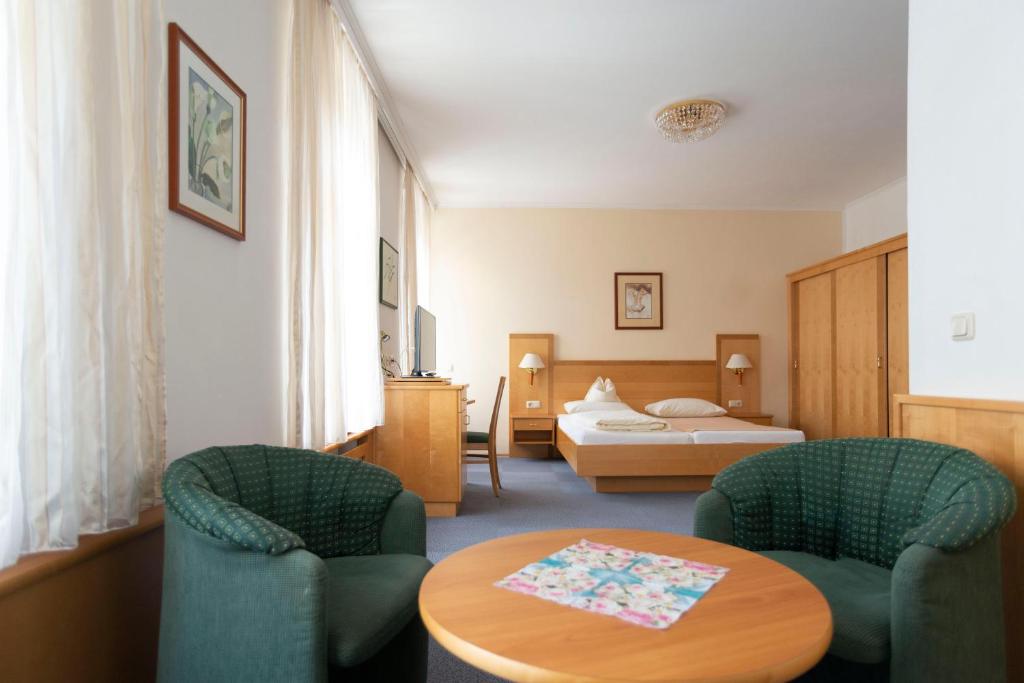 Posteľ alebo postele v izbe v ubytovaní Fleger Appartements