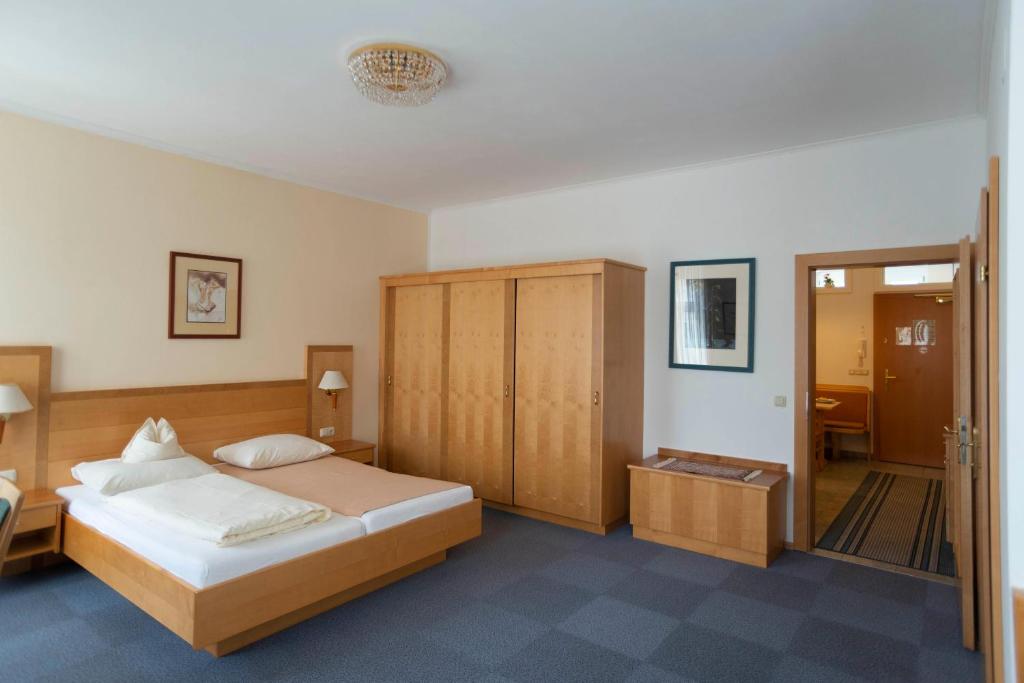 Posteľ alebo postele v izbe v ubytovaní Fleger Appartements