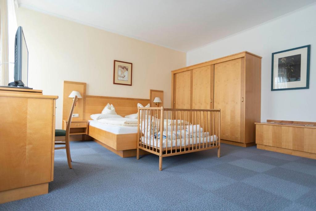 Posteľ alebo postele v izbe v ubytovaní Fleger Appartements