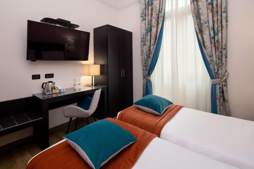 Postel nebo postele na pokoji v ubytování Best Western Plus Hotel Genova