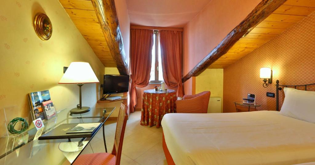 Postel nebo postele na pokoji v ubytování Best Western Plus Hotel Genova