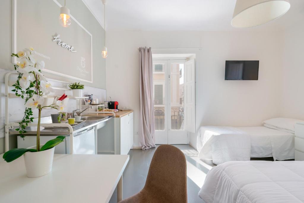 A bed or beds in a room at Palazzo Berardi