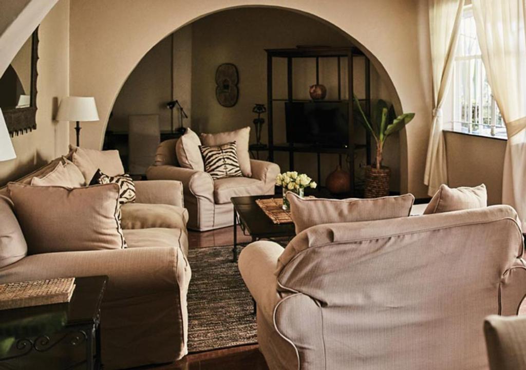 Posezení v ubytování Palacina The Residence & The Suites