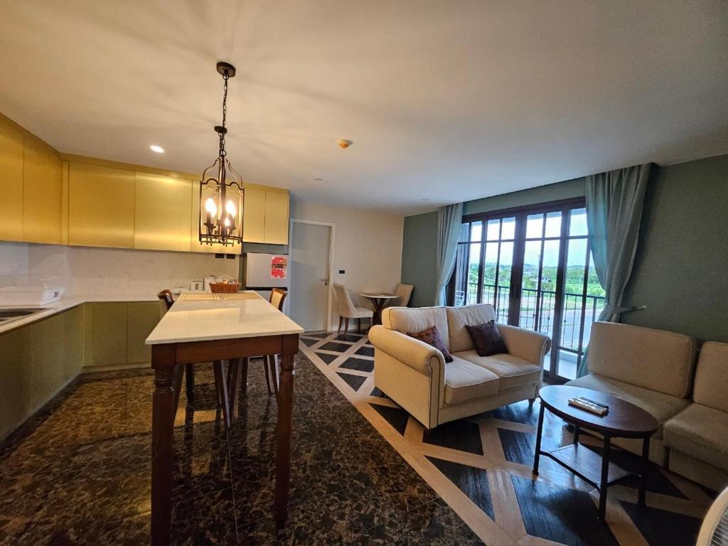 Køkken eller tekøkken på Espana Jomtien Pattaya By Thita