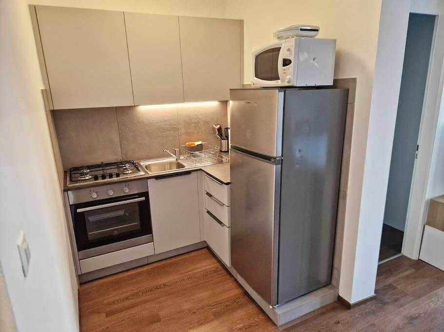 Kuchyň nebo kuchyňský kout v ubytování Confortevole appartamento nel cuore di Lugano