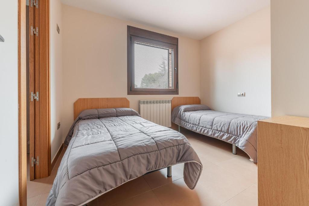Postel nebo postele na pokoji v ubytování Casa de San Cristóbal