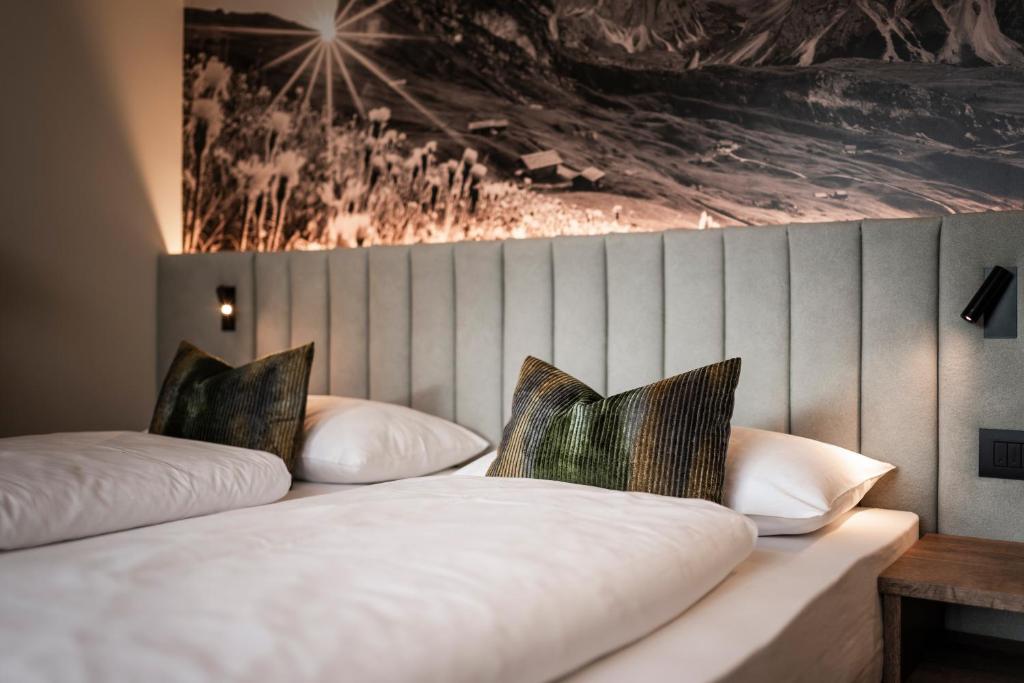 Postel nebo postele na pokoji v ubytování Hotel Belaval