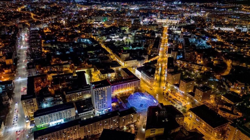 an aerial view of a city at night at Unirea Hotel & Spa in Iaşi