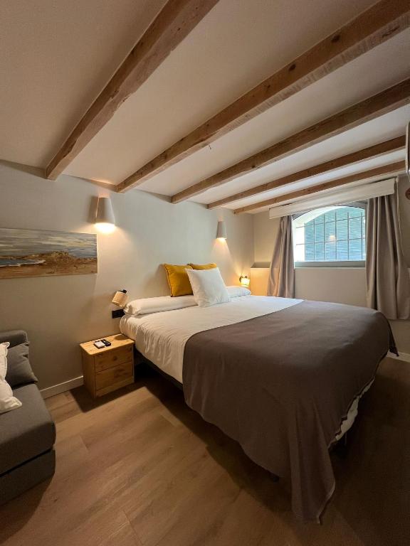 Postel nebo postele na pokoji v ubytování Calendula Hotel & Apartaments
