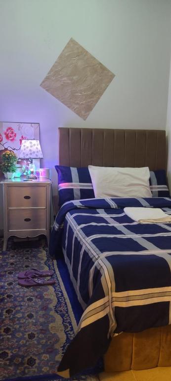 Postel nebo postele na pokoji v ubytování Home Away Apartment