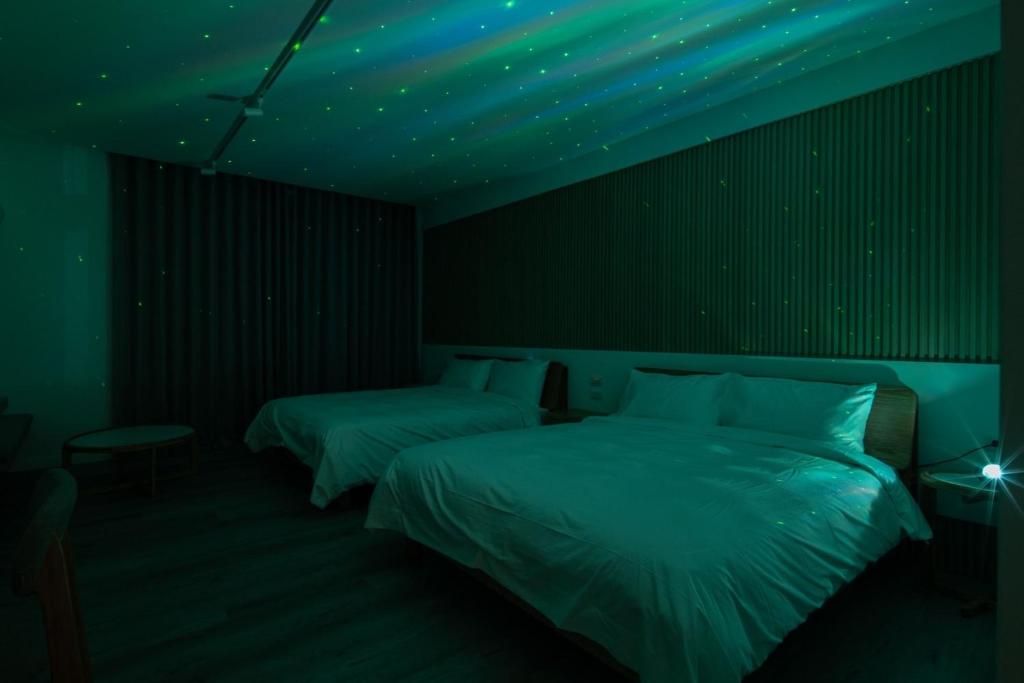 Letto o letti in una camera di Yong Li Hotel