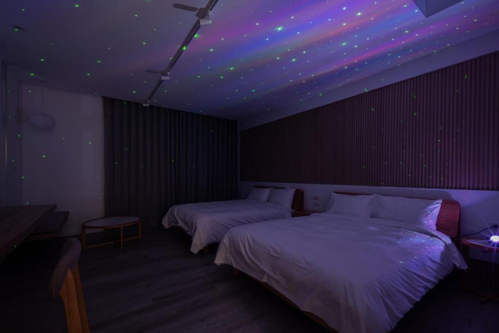 Letto o letti in una camera di Yong Li Hotel