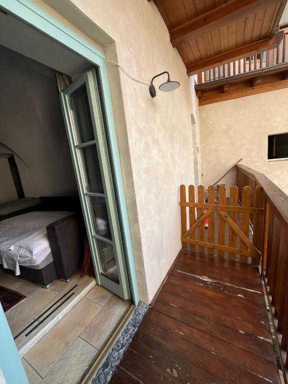 Postel nebo postele na pokoji v ubytování Appartamento incantevole Fondo Val di Non