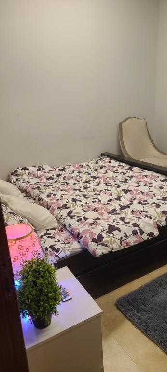 Postel nebo postele na pokoji v ubytování Home Away Apartment