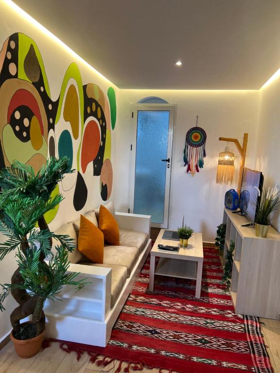 Posezení v ubytování Art Riad Au Bord De La Mer
