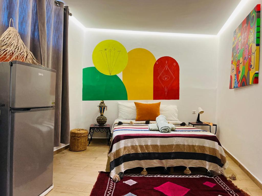 Postel nebo postele na pokoji v ubytování Art Riad Au Bord De La Mer