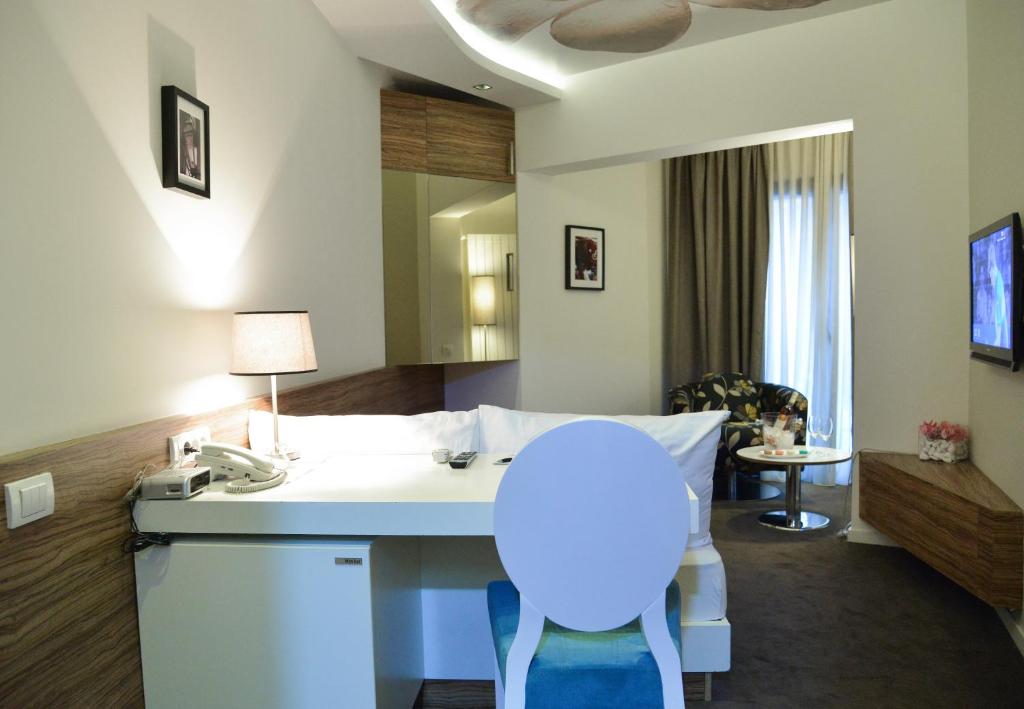 Uma televisão e/ou sistema de entretenimento em Hotel Sole