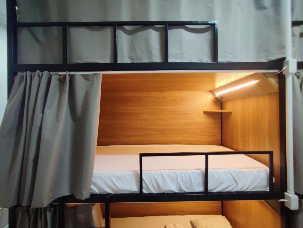 Postel nebo postele na pokoji v ubytování Hostel Casarão 65
