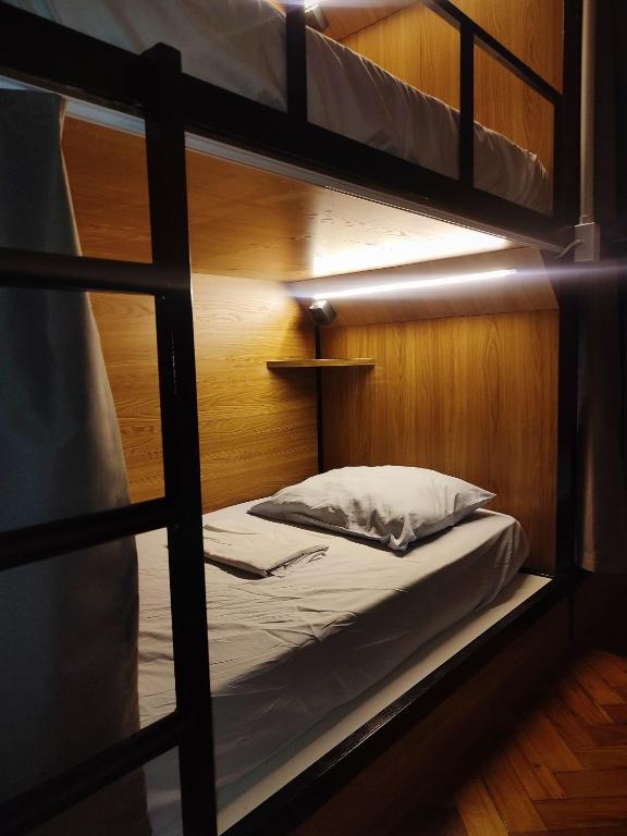 Postel nebo postele na pokoji v ubytování Hostel Casarão 65