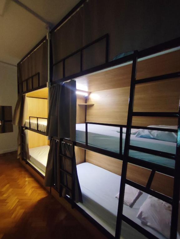 Postel nebo postele na pokoji v ubytování Hostel Casarão 65