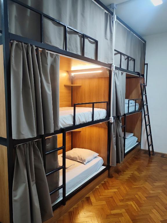 Postel nebo postele na pokoji v ubytování Hostel Casarão 65