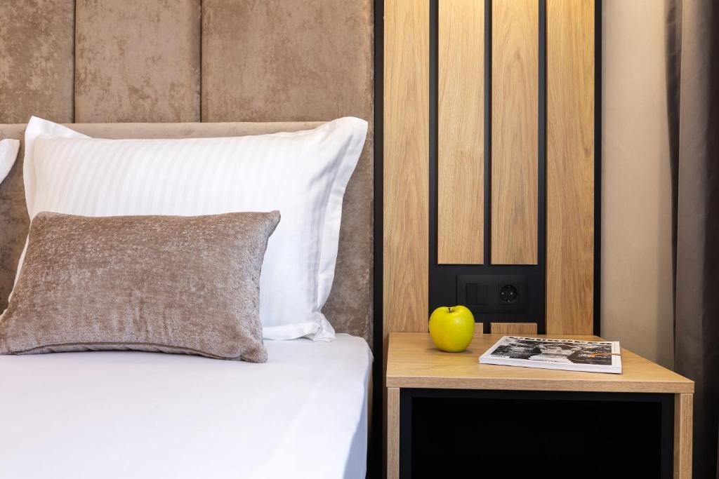 Postel nebo postele na pokoji v ubytování AMAR Design Hotel by HMG