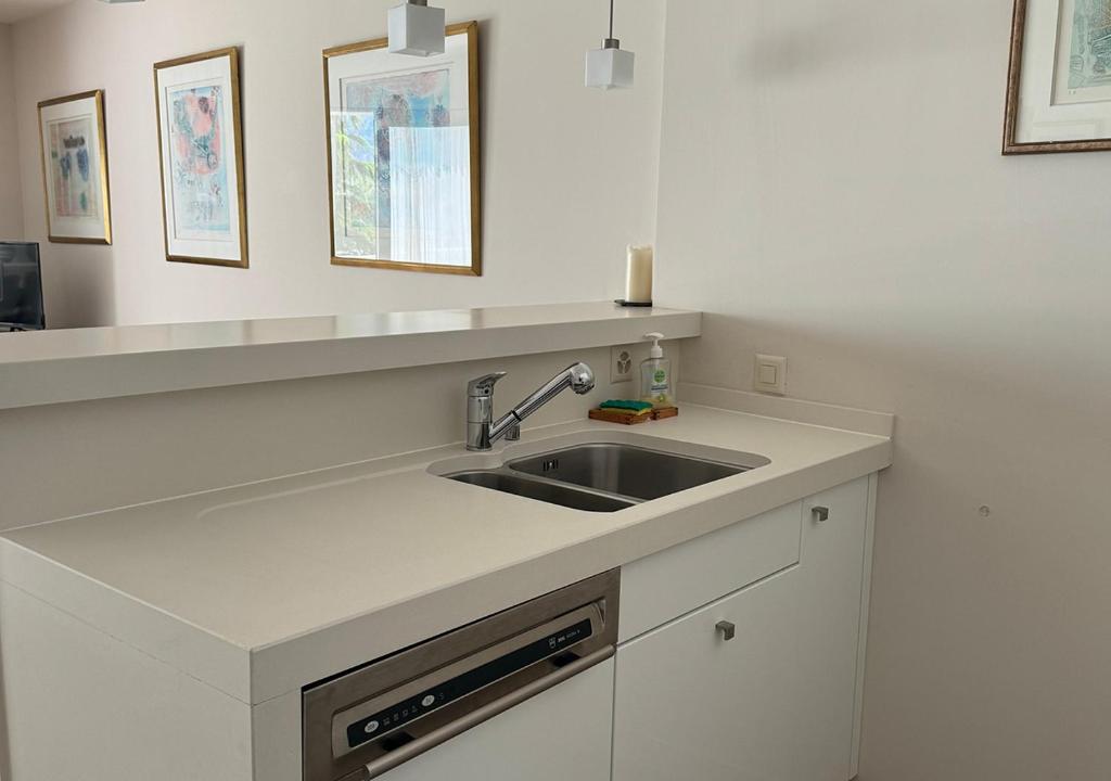 Kuchyň nebo kuchyňský kout v ubytování Hôtel des Bains de Saillon