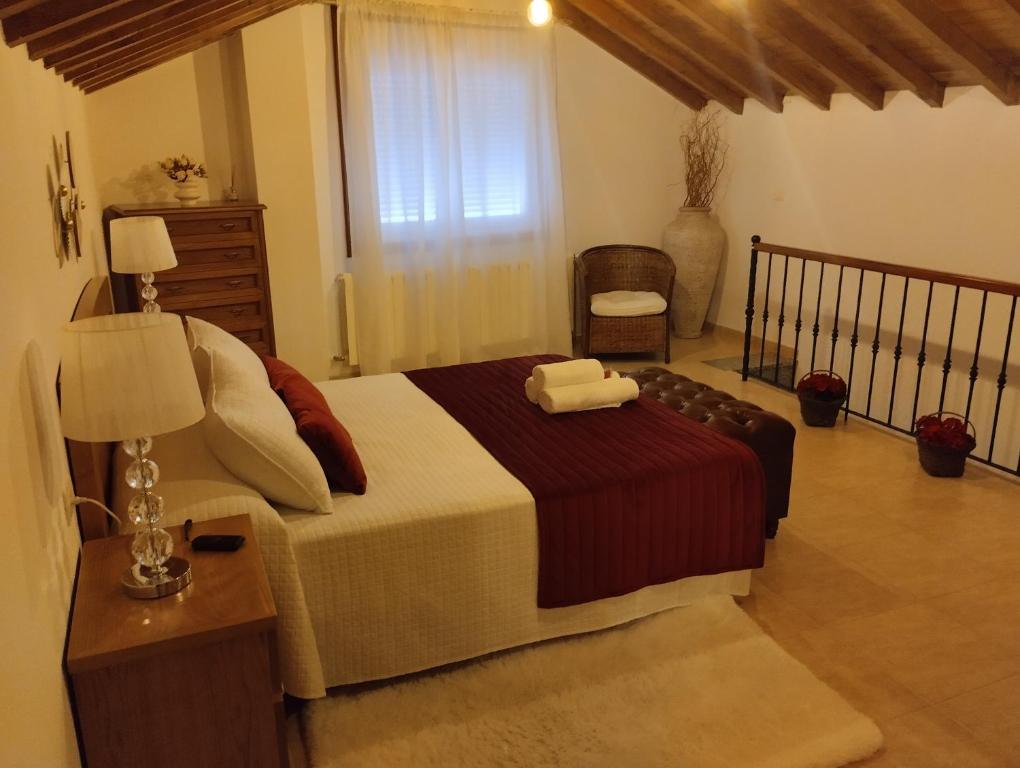 A bed or beds in a room at Casa Xarreiro