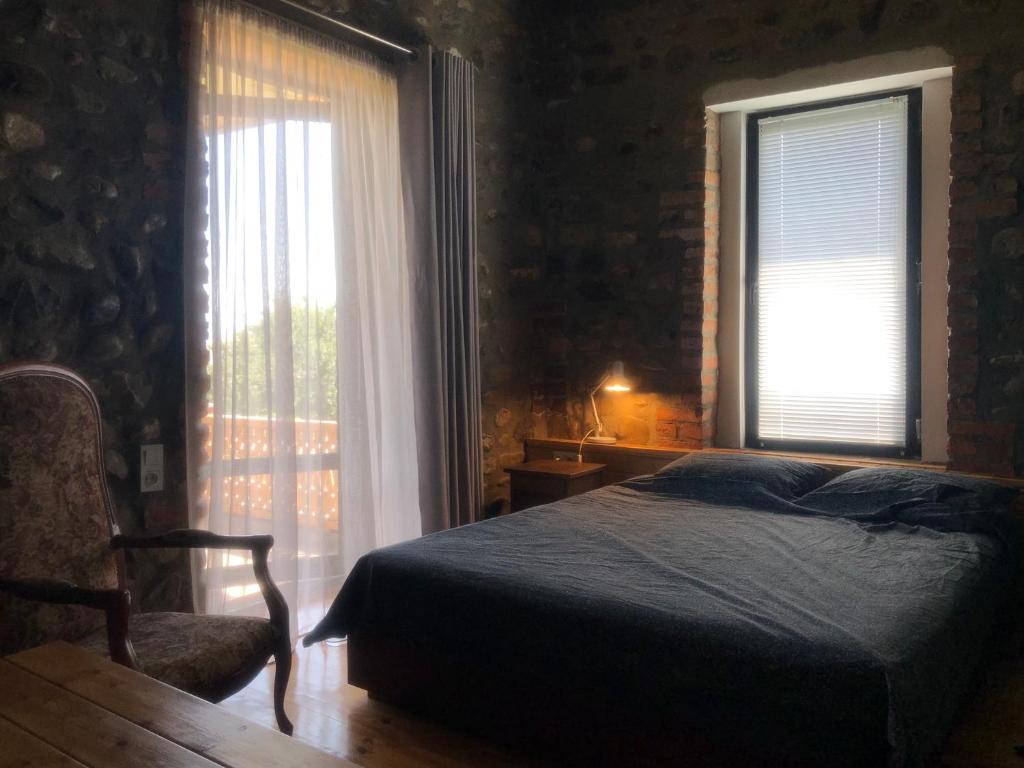 Postel nebo postele na pokoji v ubytování Lokokina Guesthouse
