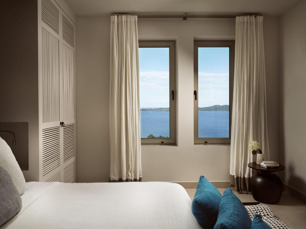 Postel nebo postele na pokoji v ubytování Eagles Villas - Small Luxury Hotels of The World