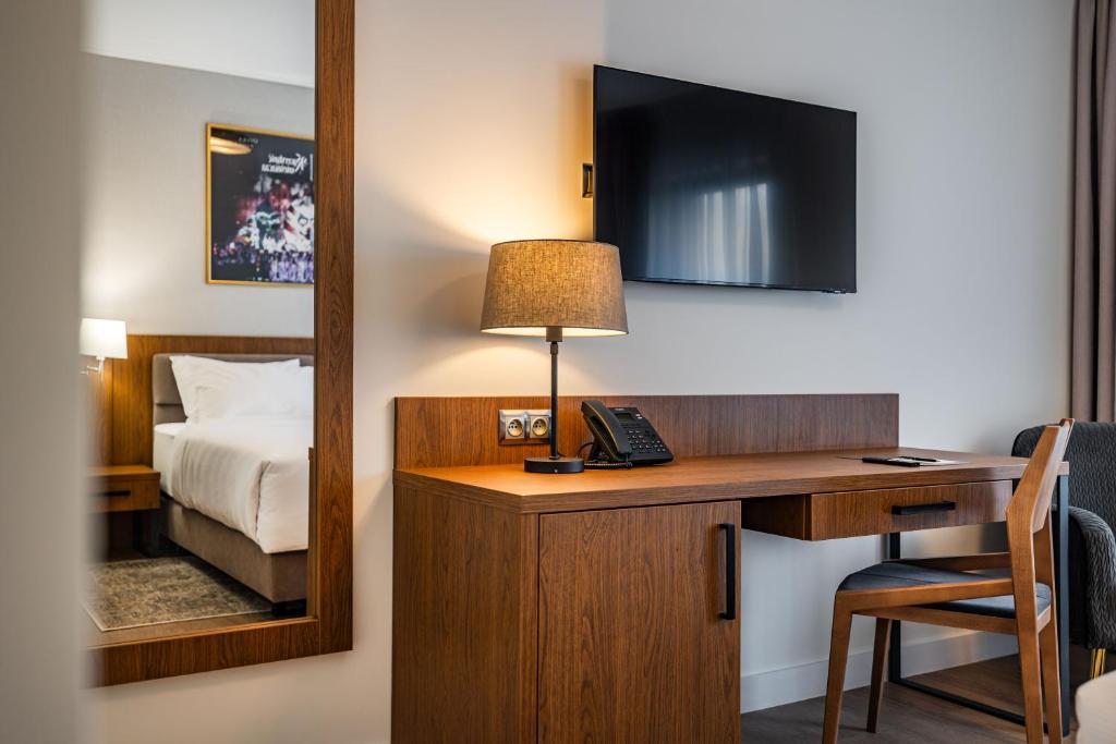 TV a/nebo společenská místnost v ubytování Hotel Opera