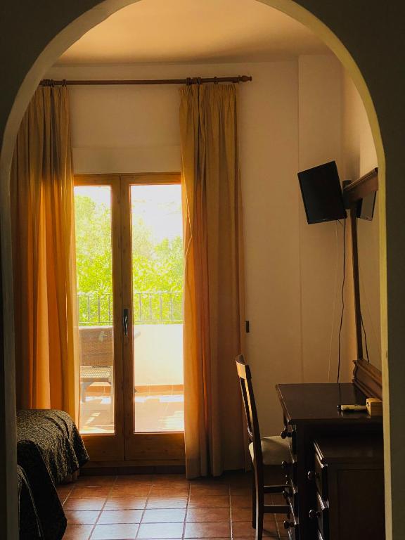 TV a/nebo společenská místnost v ubytování Hotel Galera