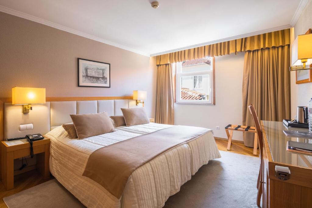 Postel nebo postele na pokoji v ubytování Hotel Boa - Vista
