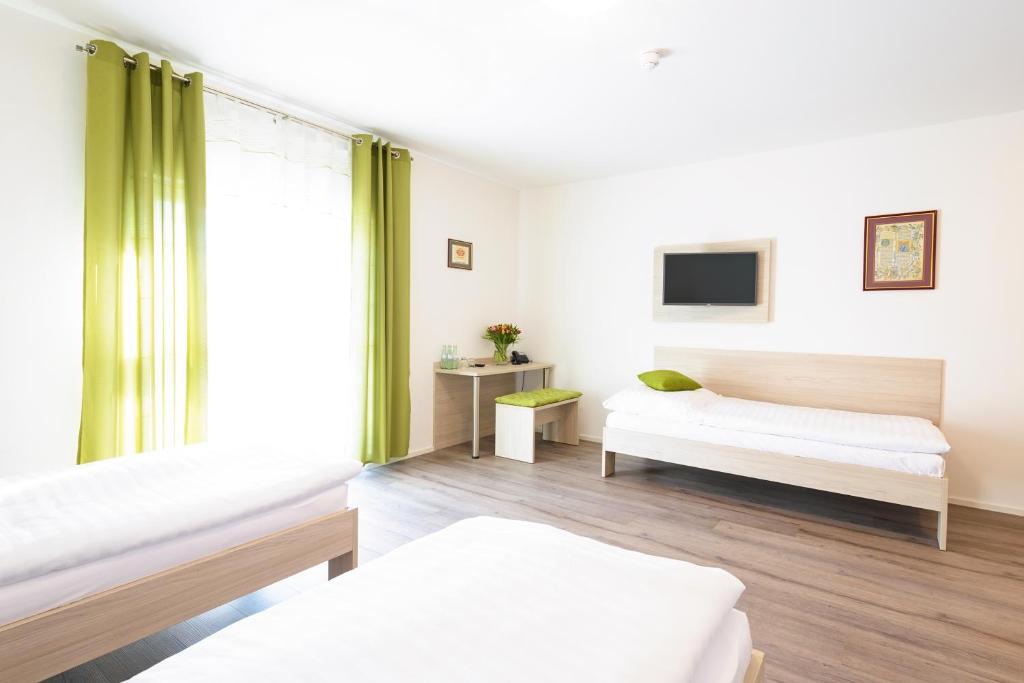 Ένα ή περισσότερα κρεβάτια σε δωμάτιο στο Apartment mit 1 Schlafzimmer HI-1