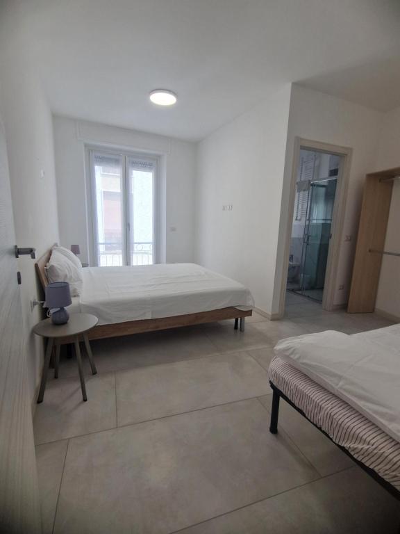 Postel nebo postele na pokoji v ubytování Enissa