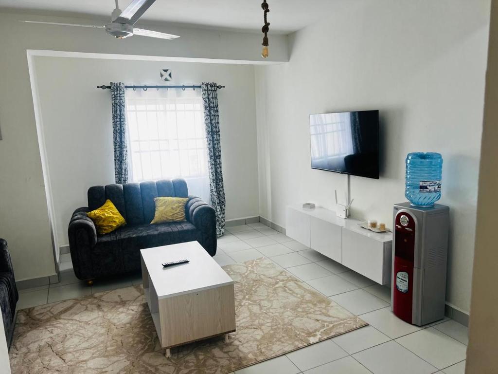 TV a/nebo společenská místnost v ubytování Gianas stays with pool