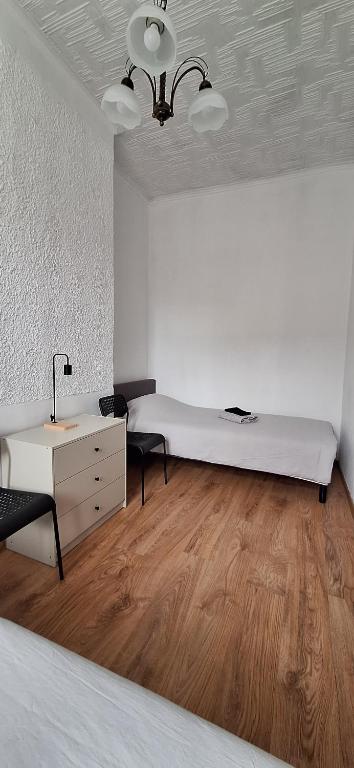 Postel nebo postele na pokoji v ubytování Serce Przemyśla